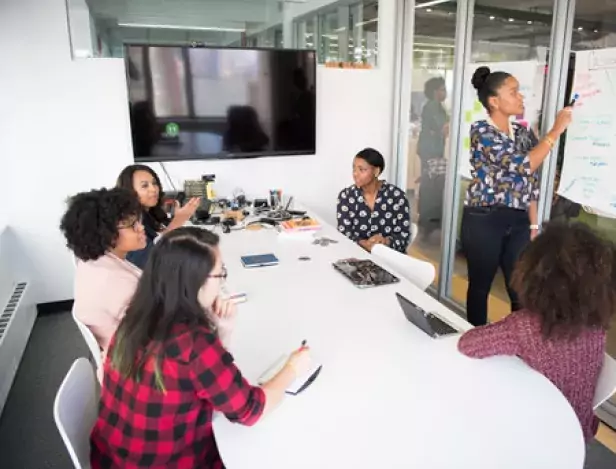 six-woman-standing-and-siting-inside-the-room-1181622